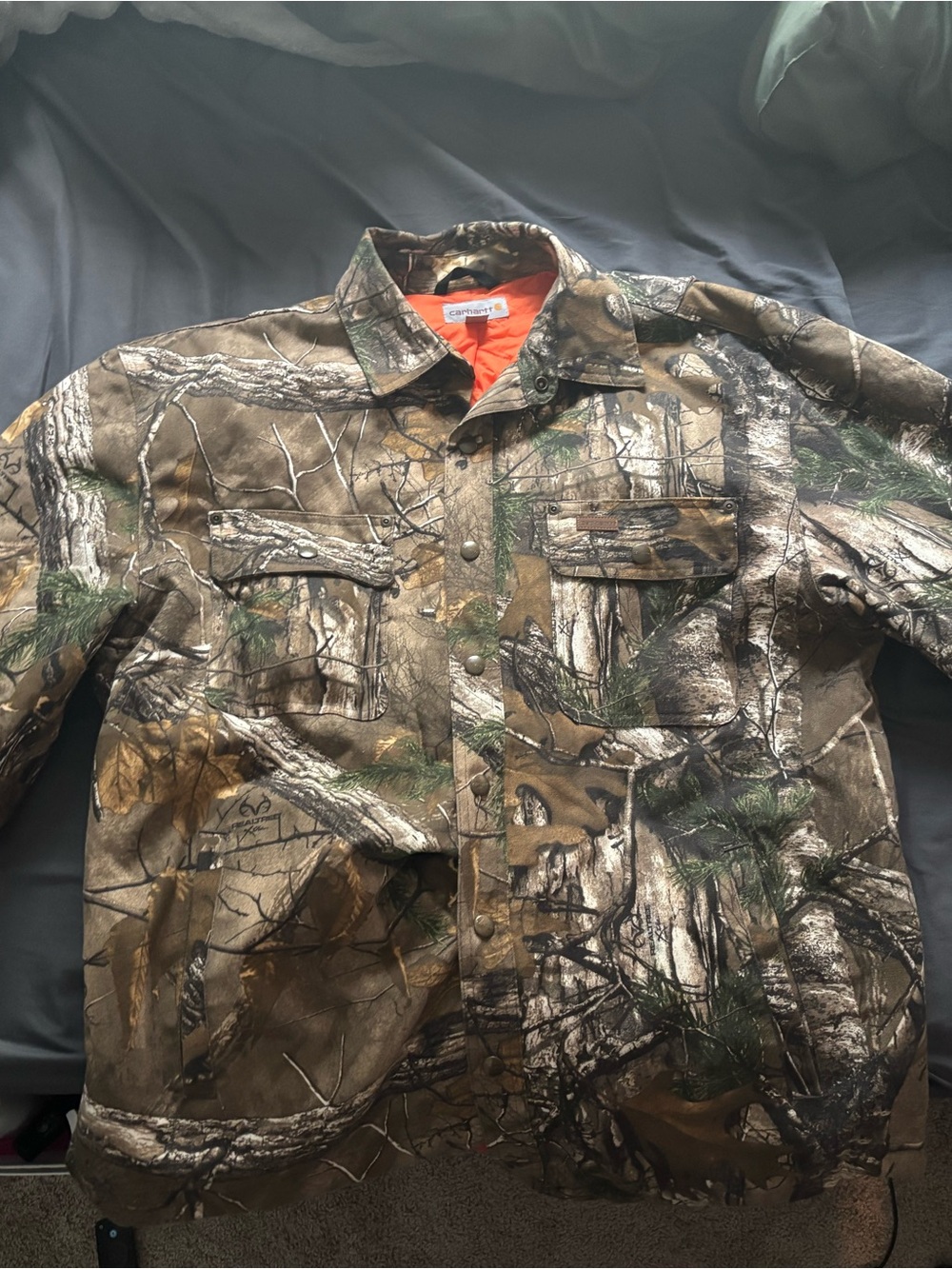 Carhartt Men’s Realtree Camo Puffer Jacket with Orange Lining